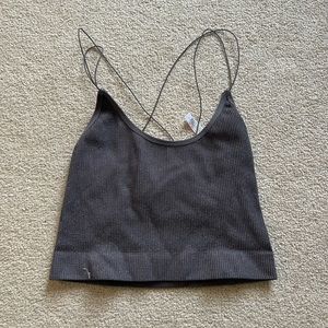 Urban Outfitters out from under tank top